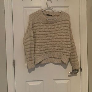 A beige sweater